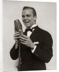 1920s 1930s Man Radio Singer Entertainer Crooner In Tuxedo Singing Into Microphone by Anonymous