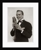 1920s 1930s Man Radio Singer Entertainer Crooner In Tuxedo Singing Into Microphone by Anonymous