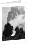 1930s 1940s Head-On View Of Three Steam Engines Silhouetted Against Billowing Smoke And Steam Outdoor by Anonymous