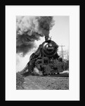 1920s 1930s Steam Engine Pulling Passenger Train Smoke Billowing From Exhaust Stack by Anonymous