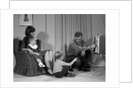 1960s Family Mother Father Son Daughter Watching Television In Living Room Indoor by Anonymous