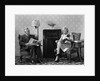 1940s Senior Couple Sitting In Living Room Reading Newspaper And Magazine Listening To Radio by Anonymous
