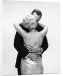 1950s 1960s Wife In Backless Satin Gown Evening Dress And Husband Embracing And Kissing by Anonymous