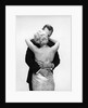 1950s 1960s Wife In Backless Satin Gown Evening Dress And Husband Embracing And Kissing by Anonymous