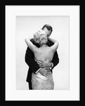 1950s 1960s Wife In Backless Satin Gown Evening Dress And Husband Embracing And Kissing by Anonymous