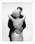 1950s 1960s Wife In Backless Satin Gown Evening Dress And Husband Embracing And Kissing by Anonymous