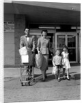 1950s Family Walking Out Of Supermarket Store by Anonymous