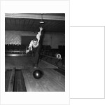 1930s Man Bowling Just Releasing Ball Into Alley by Anonymous