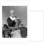 1930s Elderly Woman Wearing Pince-Nez Glasses Sitting Knitting by Anonymous