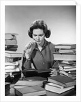 1950s 1960s College Woman Studying Surrounded All Around By Piles Of Books by Anonymous
