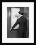 1930s 1940s Man In Suit And Hat Opening Door Marked Loans by Anonymous