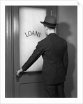 1930s 1940s Man In Suit And Hat Opening Door Marked Loans by Anonymous