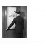 1930s 1940s Man In Suit And Hat Opening Door Marked Loans by Anonymous