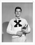 1940s 1950s Portrait Boy Student Carrying Books Wearing Football Letter Sweater by Anonymous
