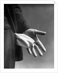 1930s Man's Hand Turning Empty Pants Pocket Inside Out by Anonymous