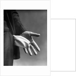 1930s Man's Hand Turning Empty Pants Pocket Inside Out by Anonymous