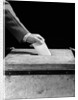 1930s 1940s Man's Hand Putting Ballot In Slot In Box by Anonymous