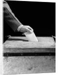 1930s 1940s Man's Hand Putting Ballot In Slot In Box by Anonymous