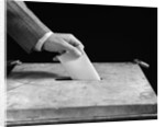 1930s 1940s Male Hand Dropping Paper Ballot In Voting Box by Anonymous