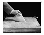 1930s 1940s Male Hand Dropping Paper Ballot In Voting Box by Anonymous