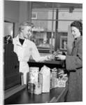 1950s Woman Grocery Store Checkout Female Cashier by Anonymous