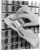 1940s Hand Woman Matching Spool Of Thread To Swatch Of Material by Anonymous