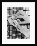 1940s Hand Woman Matching Spool Of Thread To Swatch Of Material by Anonymous