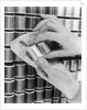 1940s Hand Woman Matching Spool Of Thread To Swatch Of Material by Anonymous