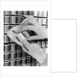 1940s Hand Woman Matching Spool Of Thread To Swatch Of Material by Anonymous