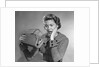 1950s Woman With Exaggerated Expression Hand On Face Looking Inside Her Purse by Anonymous