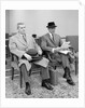 1950s 1960s Two Men Businessman Salesman Sitting In Office Reception Waiting Area Indoor by Anonymous