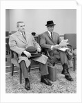 1950s 1960s Two Men Businessman Salesman Sitting In Office Reception Waiting Area Indoor by Anonymous