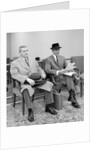 1950s 1960s Two Men Businessman Salesman Sitting In Office Reception Waiting Area Indoor by Anonymous