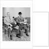 1950s 1960s Two Men Businessman Salesman Sitting In Office Reception Waiting Area Indoor by Anonymous