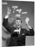 1960s Happy Man Throwing Money Currency Bank Notes In The Air by Anonymous