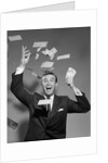 1960s Happy Man Throwing Money Currency Bank Notes In The Air by Anonymous