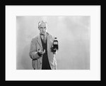 1930s Dour Man In Lab Coat Holding Bottle Of Poison by Anonymous