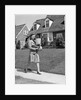 1940s Woman Walking Shopping Carrying Grocery Bag On Suburban House Sidewalk by Anonymous