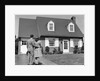 1940s Couple Looking At House by Anonymous