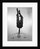 1960s Man In Shirt and Tie Standing On Head by Anonymous