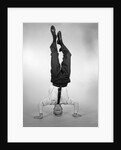 1960s Man In Shirt and Tie Standing On Head by Anonymous