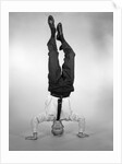1960s Man In Shirt and Tie Standing On Head by Anonymous