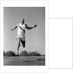 1960s Man Running Winning Sprinting Across The Finish Line Outdoor by Anonymous