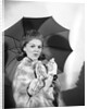 1960s Woman With Umbrella Holding Bags Of Money Save Your Money For A Rainy Day by Anonymous