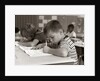 1960s Boy Striped T-Shirt Elementary School Classroom Sitting Desk Writing Test by Anonymous