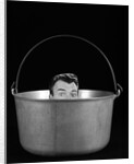 1950s 1960s Symbolic Montage Portrait Man In The Soup Looking Wide Eyed From Inside The Kettle by Anonymous