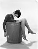 1960s Young Woman In Trash Can by Anonymous