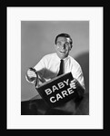 1960s Man Father Holding Baby Care Book by Anonymous
