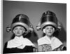 1950s Two Women Under Hair Dryers Towels Around Shoulders Hair Nets by Anonymous