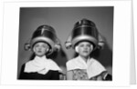 1950s Two Women Under Hair Dryers Towels Around Shoulders Hair Nets by Anonymous